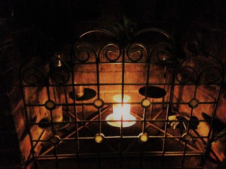 candle in fireplace